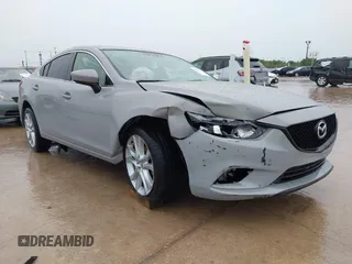 2016 Mazda 6 i Touring with VIN JM1GJ1V52G1463042, listed as a IAAI auction lot 42369747 with 136,849 mi miles and . Bid and sale history available at DreamBid. Image 1.