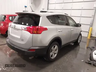 2014 Toyota RAV4 XLE with VIN JTMRFREV5ED052819, listed as a IAAI auction lot 42014672 with 235,481 mi miles and . Bid and sale history available at DreamBid. Image 4.