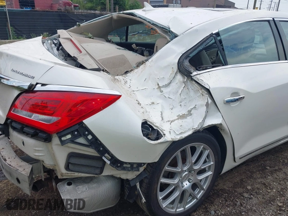 2014 Buick LaCrosse Premium I with VIN 1G4GD5G36EF226642, listed as a IAAI auction lot 42611309 with 137,206 mi miles and . Bid and sale history available at DreamBid. Image 19.