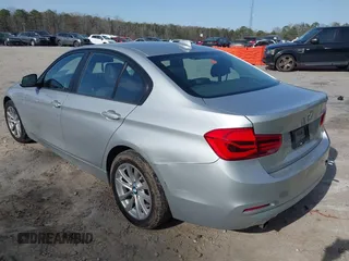 2018 BMW 3 Series 320i with VIN WBA8A9C55JAH14990, listed as a IAAI auction lot 41719896 with 77,472 mi miles. Bid and sale history available at carsss.com. Image 3.