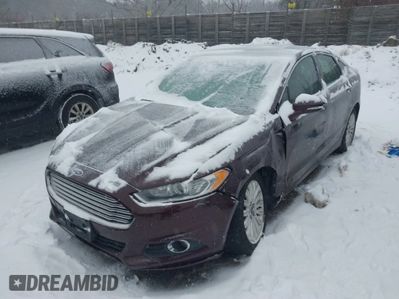 2013 Ford Fusion SE Hybrid with VIN 3FA6P0LU1DR316619, listed as a IAAI auction lot 41515812 with 136,669 mi miles and . Bid and sale history available at carsss.com. Image 2.