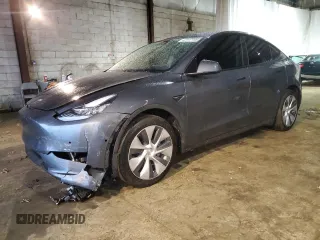 2023 Tesla Model Y Long Range with VIN 7SAYGAEE8PF584641, listed as a Copart auction lot 47117195 with 20,568 mi miles and Salvage Title. Bid and sale history available at DreamBid. Image 1.