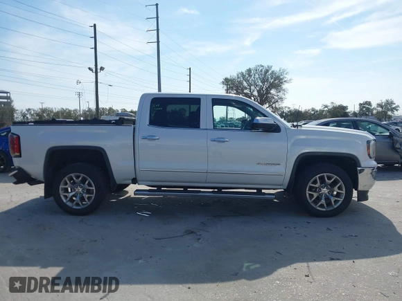 2017 GMC Sierra 1500 SLT with VIN 3GTP1NECXHG423591, listed as a IAAI auction lot 41509177 with 100,071 mi miles and . Bid and sale history available at DreamBid. Image 13.