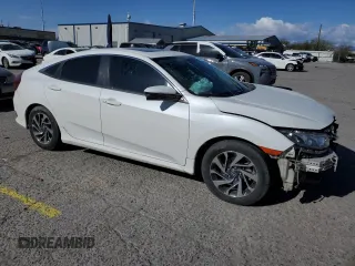 2018 Honda Civic EX with VIN 2HGFC2F77JH507767, listed as a Copart auction lot 50453785 with 153,104 mi miles and Salvage Title. Bid and sale history available at DreamBid. Image 4.