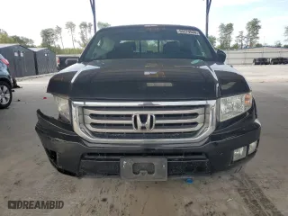 2013 Honda Ridgeline RTL with VIN 5FPYK1F59DB003984, listed as a Copart auction lot 69279944 with 237,917 mi miles and Salvage Title. Bid and sale history available at carsss.com. Image 5.