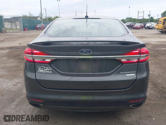 2017 Ford Fusion Titanium with VIN 3FA6P0K96HR208757, listed as a IAAI auction lot 42400172 with 90,000 mi miles and . Bid and sale history available at DreamBid. Image 16.