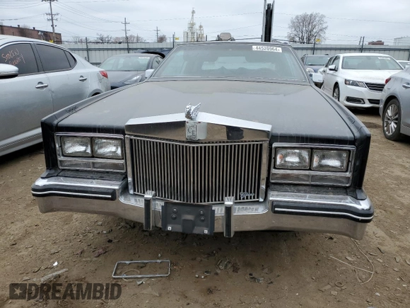 1985 Cadillac Eldorado z VIN 1G6EL5782FE634074, wystawiony jako Copart lot #44520964 z przebiegiem 74 425 mil mil oraz Szkody całkowita. Historia ofert i sprzedaży dostępna na DreamBid. Obrazek 5.
