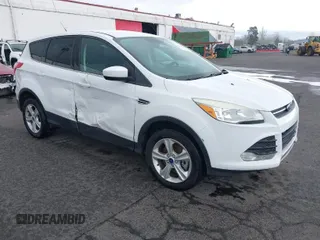 2013 Ford Escape SE with VIN 1FMCU9G93DUA17816, listed as a IAAI auction lot 41688140 with 129,738 mi miles. Bid and sale history available at carsss.com. Image 1.