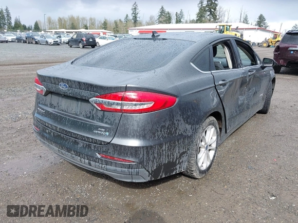 2019 Ford Fusion SE with VIN 3FA6P0LU6KR272193, listed as a IAAI auction lot 41993485 with 132,845 mi miles and . Bid and sale history available at DreamBid. Image 4.