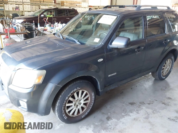 2008 Mercury Mariner Premier with VIN 4M2CU97198KJ30843, listed as a IAAI auction lot 42579794 with 109,983 mi miles and . Bid and sale history available at DreamBid. Image 2.