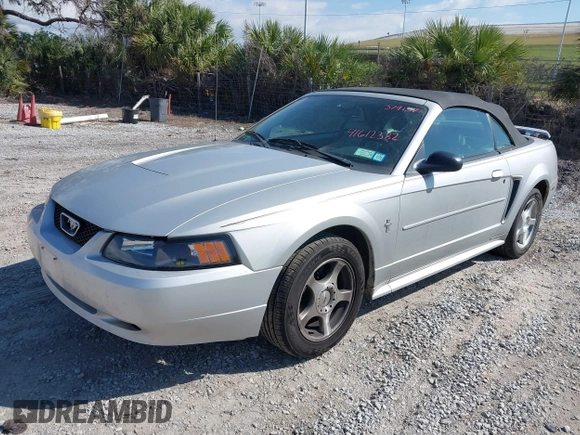 2003 Ford Mustang Deluxe z VIN 1FAFP44453F379157, wystawiony jako IAAI lot #41612382 z przebiegiem 107 599 mil mil oraz . Historia ofert i sprzedaży dostępna na DreamBid. Obrazek 2.
