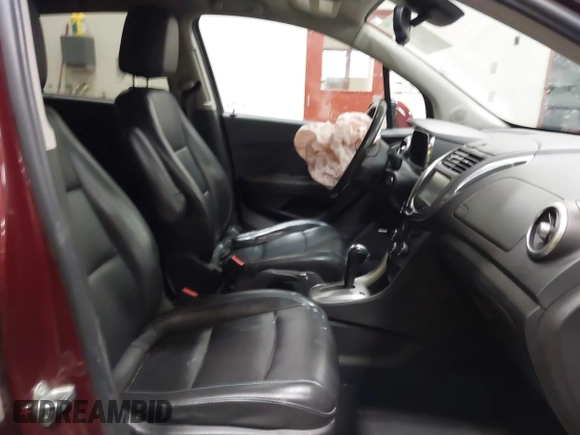 2016 Chevrolet Trax LTZ with VIN 3GNCJRSB9GL166289, listed as a IAAI auction lot 41674434 with 157,109 mi miles. Bid and sale history available at carsss.com. Image 5.