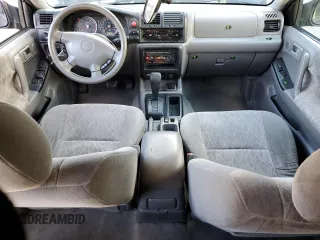 2003 Isuzu Rodeo with VIN 4S2CK58W334306303, listed as a Copart auction lot 83820444 with 180,040 mi miles and Salvage Title. Bid and sale history available at DreamBid. Image 8.