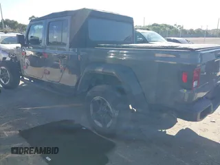 2021 Jeep Gladiator Willys with VIN 1C6HJTAG4ML517715, listed as a IAAI auction lot 41436634 with 21,187 mi miles and . Bid and sale history available at DreamBid. Image 3.