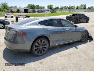 2014 Tesla Model S 60 z VIN 5YJSA1H13EFP36058, wystawiony jako Copart lot #57041725 z przebiegiem Nie podano mil oraz Szkoda całkowita • Salvage title. Historia ofert i sprzedaży dostępna na DreamBid. Obrazek 3.