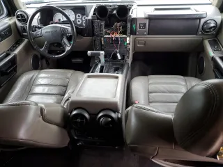 2003 Hummer H2 with VIN 5GRGN23U83H143843, listed as a Copart auction lot 43792915 with 115,569 mi miles and Salvage Title. Bid and sale history available at carsss.com. Image 8.