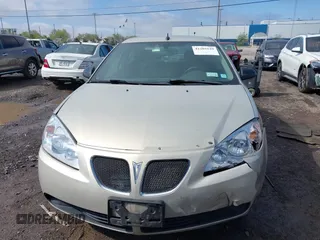 2009 Pontiac G6 1SA z VIN 1G2ZG57BX94154930, wystawiony jako IAAI lot #42205549 z przebiegiem 101 951 mil mil oraz . Historia ofert i sprzedaży dostępna na DreamBid. Obrazek 12.