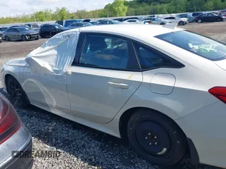 2023 Honda Civic Sport with VIN 2HGFE2F54PH512362, listed as a IAAI auction lot 41401479 with 12,672 mi miles and . Bid and sale history available at DreamBid. Image 14.
