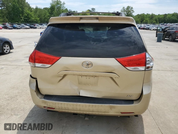 2012 Toyota Sienna XLE AAS with VIN 5TDYK3DC1CS277339, listed as a Copart auction lot 57494715 with 240,666 mi miles and Salvage title. Bid and sale history available at DreamBid. Image 6.