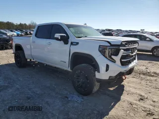 2023 GMC Sierra 1500 AT4 with VIN 3GTUUEE81PG231674, listed as a Copart auction lot 44615465 with 35,569 mi miles and Salvage title. Bid and sale history available at DreamBid. Image 4.