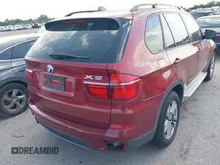 2011 BMW X5 35d with VIN 5UXZW0C52BL369293, listed as a IAAI auction lot 42477394 with 193,094 mi miles and . Bid and sale history available at DreamBid. Image 4.