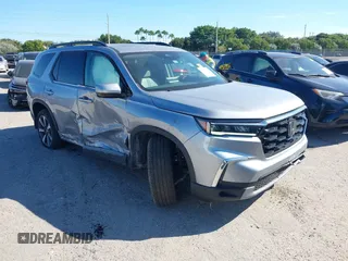 2025 Honda Pilot Touring with VIN 5FNYG2H76SB000746, listed as a IAAI auction lot 41046077 with 5,694 mi miles. Bid and sale history available at carsss.com. Image 1.
