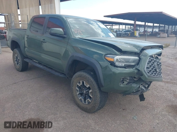2021 Toyota Tacoma SR z VIN 3TYCZ5AN2MT049069, wystawiony jako IAAI lot #42116964 z przebiegiem 96 275 mil mil oraz . Historia ofert i sprzedaży dostępna na DreamBid. Obrazek 1.