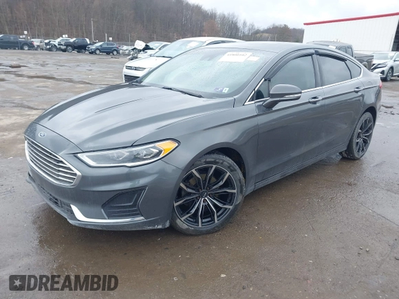 2019 Ford Fusion SEL with VIN 3FA6P0CD6KR141832, listed as a IAAI auction lot 41800102 with 142,282 mi miles and . Bid and sale history available at DreamBid. Image 23.