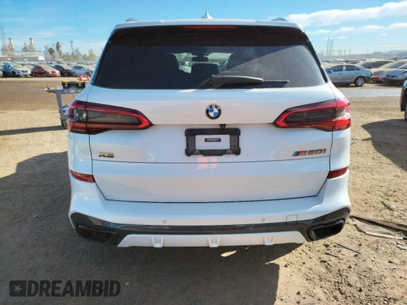 2020 BMW X5 M50i with VIN 5UXJU4C00L9B77869, listed as a Copart auction lot 36123043 with 27,195 mi miles. Bid and sale history available at carsss.com. Image 6.