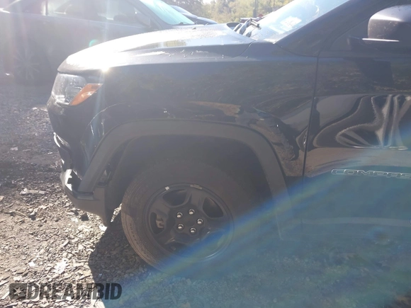 2021 Jeep Compass Sport with VIN 3C4NJDAB9MT591500, listed as a IAAI auction lot 40517034 with 58,230 mi miles and . Bid and sale history available at DreamBid. Image 21.