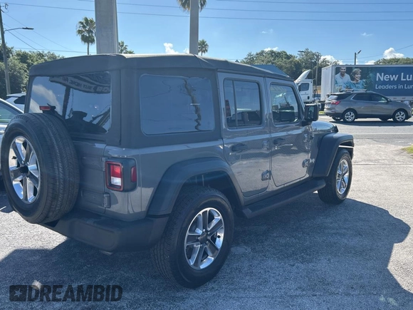 2021 Jeep Wrangler Unlimited Willys z VIN 1C4HJXDNXMW549111, wystawiony jako Copart lot #61692645 z przebiegiem 40 883 mil mil oraz Czysty tytuł • Clean title. Historia ofert i sprzedaży dostępna na DreamBid. Obrazek 4.