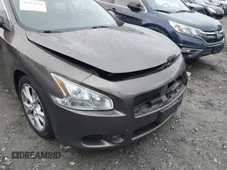 2013 Nissan Maxima SV z VIN 1N4AA5AP5DC819199, wystawiony jako IAAI lot #41519631 z przebiegiem 122 934 mil mil oraz . Historia ofert i sprzedaży dostępna na DreamBid. Obrazek 6.