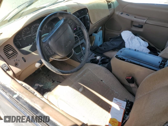 1999 Ford Explorer XLT с VIN 1FMZU34E6XZC13975, выставлен на аукционе Copart как лот 52385945 с пробегом 189 932 миль миль и Списание • Salvage title. История ставок и продаж доступна на DreamBid. Изображение 8.