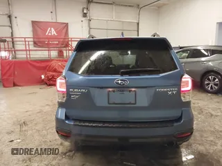 2017 Subaru Forester Touring with VIN JF2SJGTC9HH410251, listed as a IAAI auction lot 41411079 with 131,220 mi miles and . Bid and sale history available at DreamBid. Image 16.