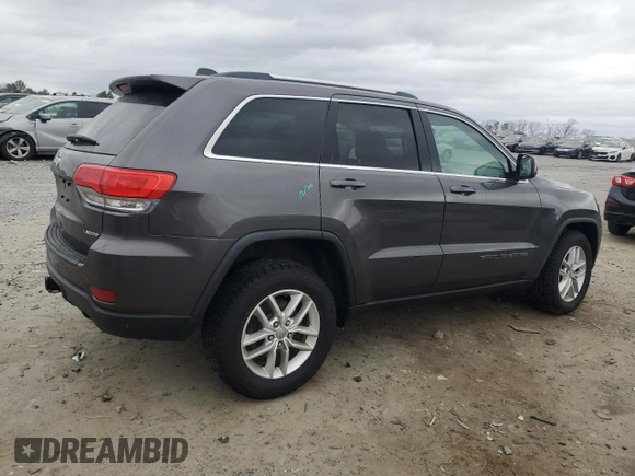 2017 Jeep Grand Cherokee Laredo with VIN 1C4RJFAG9HC750302, listed as a Copart auction lot 47601615 with 101,729 mi miles and Salvage Title. Bid and sale history available at carsss.com. Image 3.