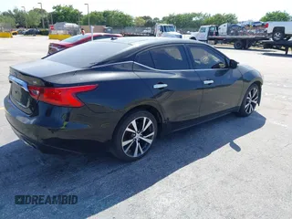 2017 Nissan Maxima SV with VIN 1N4AA6AP0HC363317, listed as a IAAI auction lot 41827159 with 132,334 mi miles. Bid and sale history available at carsss.com. Image 4.