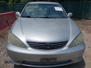2005 Toyota Camry LE z VIN 4T1BE30K95U042336, wystawiony jako IAAI lot #42457598 z przebiegiem 270 991 mil mil oraz . Historia ofert i sprzedaży dostępna na DreamBid. Obrazek 13.