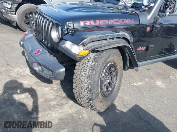 2022 Jeep Wrangler Unlimited Rubicon with VIN 1C4HJXFN0NW242903, listed as a IAAI auction lot 41448636 with 28,007 mi miles and . Bid and sale history available at DreamBid. Image 6.