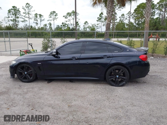 2015 BMW 4 Series 435i with VIN WBA4B1C5XFD955119, listed as a IAAI auction lot 41349918 with 181,937 mi miles and . Bid and sale history available at carsss.com. Image 15.