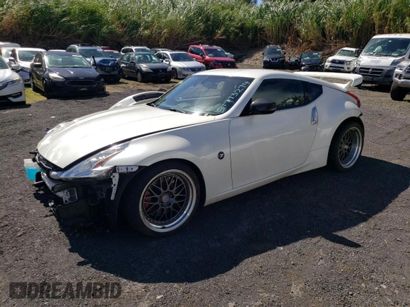 2014 Nissan 370Z Nismo with VIN JN1AZ4EH2EM630833, listed as a Copart auction lot 81773274 with 38,051 mi miles and Salvage Title. Bid and sale history available at DreamBid. Image 1.