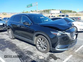 2018 Mazda CX-9 Grand Touring z VIN JM3TCADY8J0221221, wystawiony jako IAAI lot #41644721 z przebiegiem 41 510 mil mil oraz . Historia ofert i sprzedaży dostępna na DreamBid. Obrazek 1.