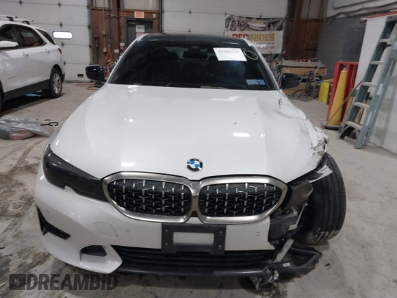 2019 BMW 3 Series 330i xDrive with VIN WBA5R7C55KAJ83482, listed as a IAAI auction lot 41565321 with 126,536 mi miles. Bid and sale history available at carsss.com. Image 12.