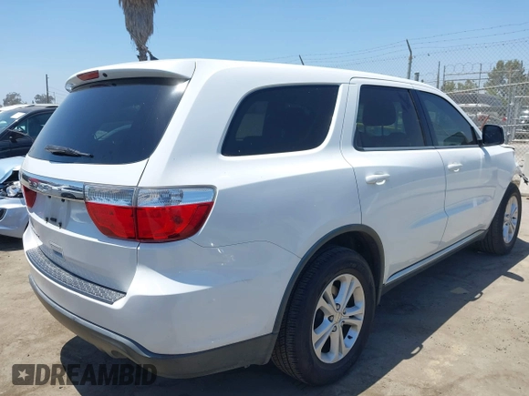 2013 Dodge Durango SXT with VIN 1C4RDHAG9DC678353, listed as a IAAI auction lot 42553988 with 174,042 mi miles and . Bid and sale history available at DreamBid. Image 4.