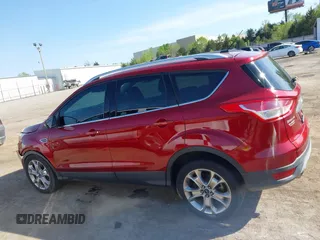 2014 Ford Escape Titanium with VIN 1FMCU0J91EUE12034, listed as a IAAI auction lot 42027493 with 160,417 mi miles and . Bid and sale history available at DreamBid. Image 14.