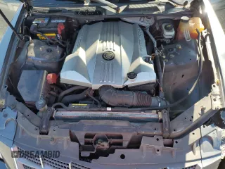 2008 Cadillac STS RWD z VIN 1G6DZ67A980172633, wystawiony jako Copart lot #59227065 z przebiegiem 186 288 mil mil oraz Szkoda całkowita • Salvage title. Historia ofert i sprzedaży dostępna na DreamBid. Obrazek 11.