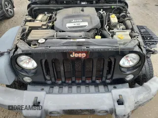 2016 Jeep Wrangler Willys Wheeler with VIN 1C4GJWAG6GL326498, listed as a Copart auction lot 62849715 with 49,414 mi miles and Salvage title. Bid and sale history available at DreamBid. Image 12.
