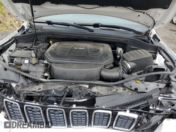 2018 Jeep Grand Cherokee Laredo E with VIN 1C4RJEAGXJC430096, listed as a Copart auction lot 57391405 with 89,248 mi miles and Salvage title. Bid and sale history available at DreamBid. Image 12.