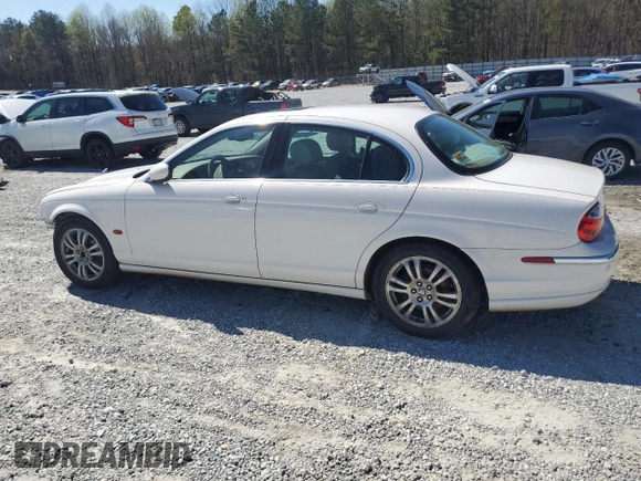 2004 Jaguar S-Type with VIN SAJEA01U14HN09950, listed as a Copart auction lot 48183785 with Not Provided miles and Salvage Title. Bid and sale history available at DreamBid. Image 2.