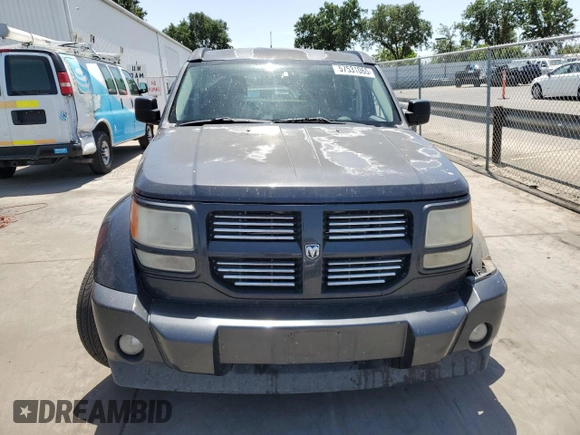 2011 Dodge Nitro Heat with VIN 1D4PU4GK7BW546475, listed as a Copart auction lot 57531065 with 157,935 mi miles and Salvage title. Bid and sale history available at DreamBid. Image 5.