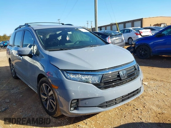 2023 Honda Odyssey Touring with VIN 5FNRL6H84PB005208, listed as a IAAI auction lot 41374452 with 60,288 mi miles and . Bid and sale history available at DreamBid. Image 1.